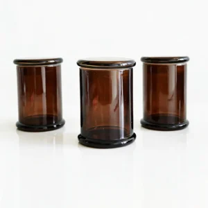 Potes de vela exclusivos na cor marrom com tampas